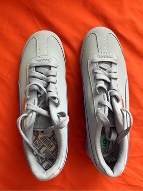 New Puma light blue sneakers.